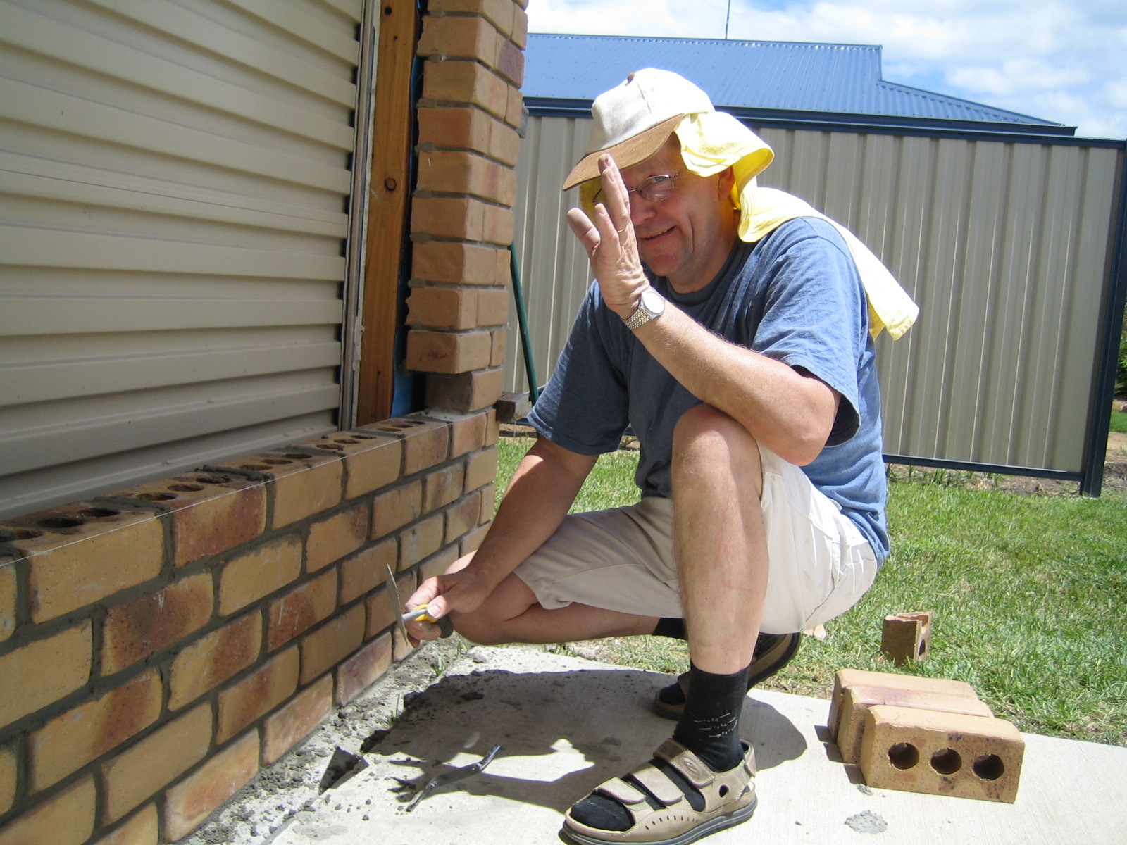 The bricklaying begins