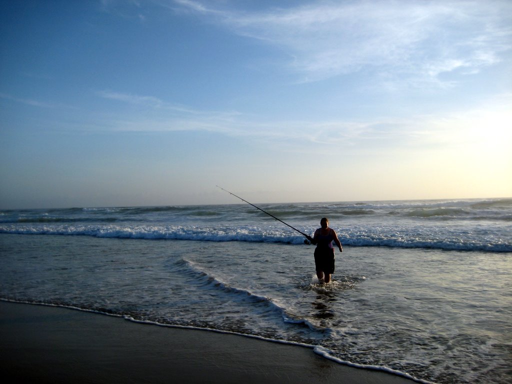 Sanna fishing in the surf