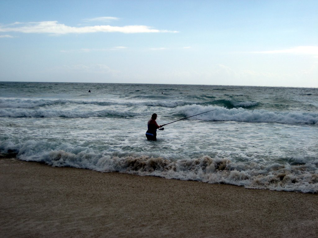 Sanna fishing in the surf