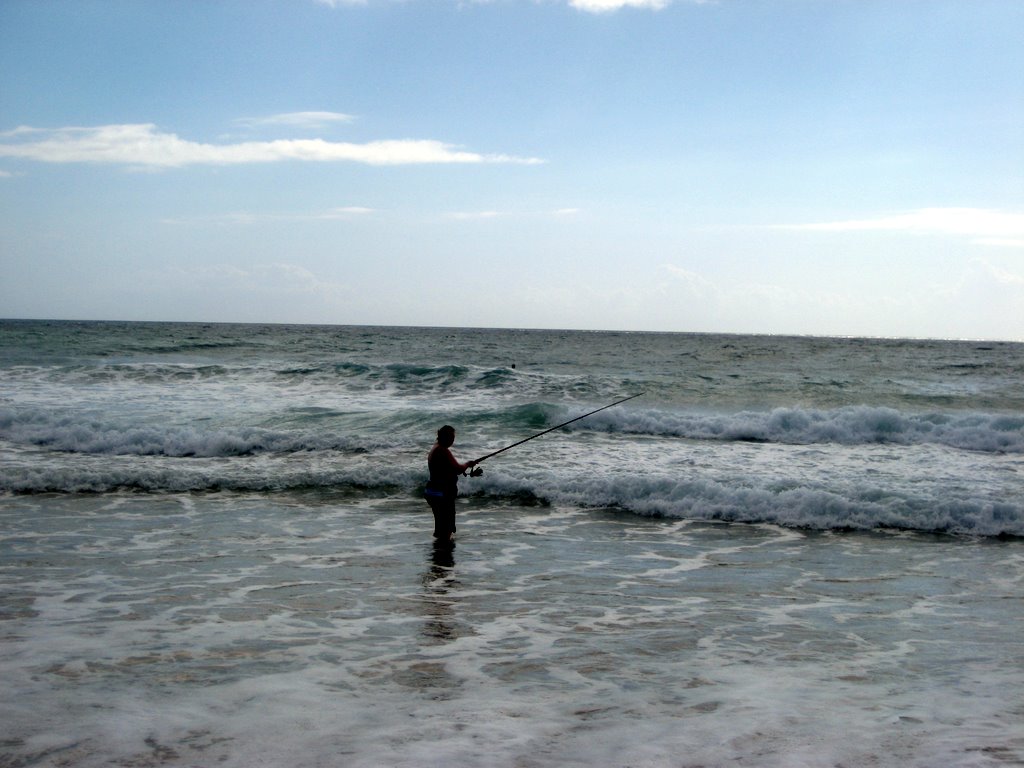 Sanna fishing in the surf
